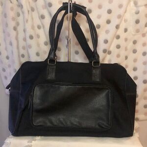 ELIZABETH ARDEN large black nylon and faux leather overnight bag. Detach straps.